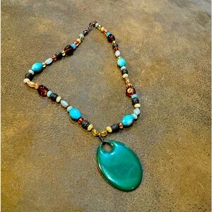 Beautiful beaded 18 inch necklace with green pendant